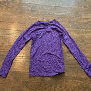 Purple and black dotted camo ish patterned women’s Lululemon swiftly size 2